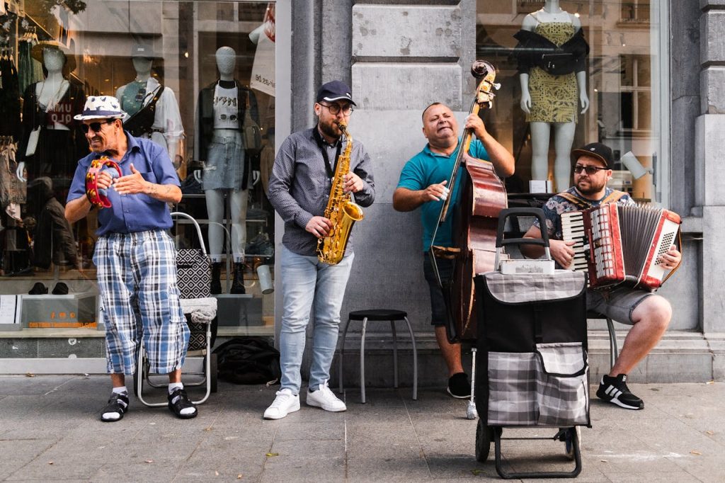 Street musicians in Antwerp energizing the crowd with live music.